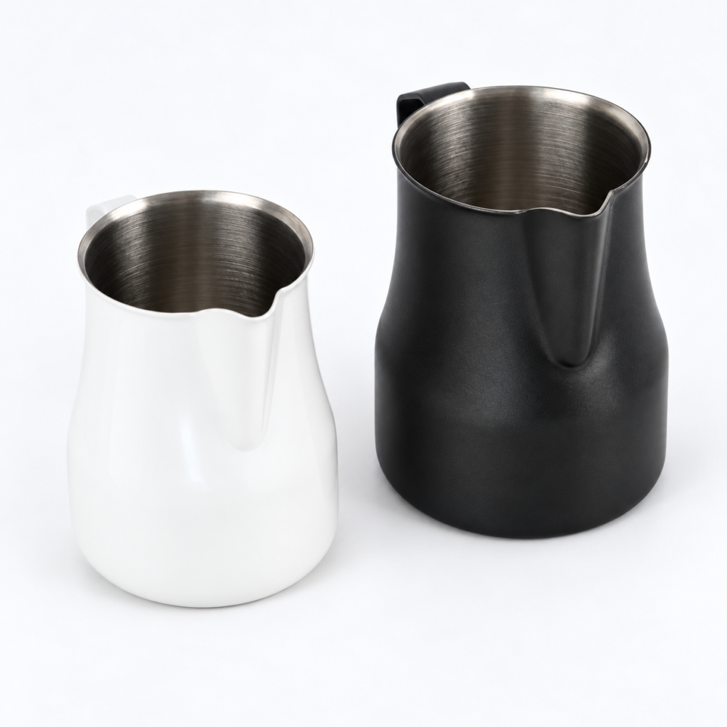 White and Black Milk Frothing Pitchers